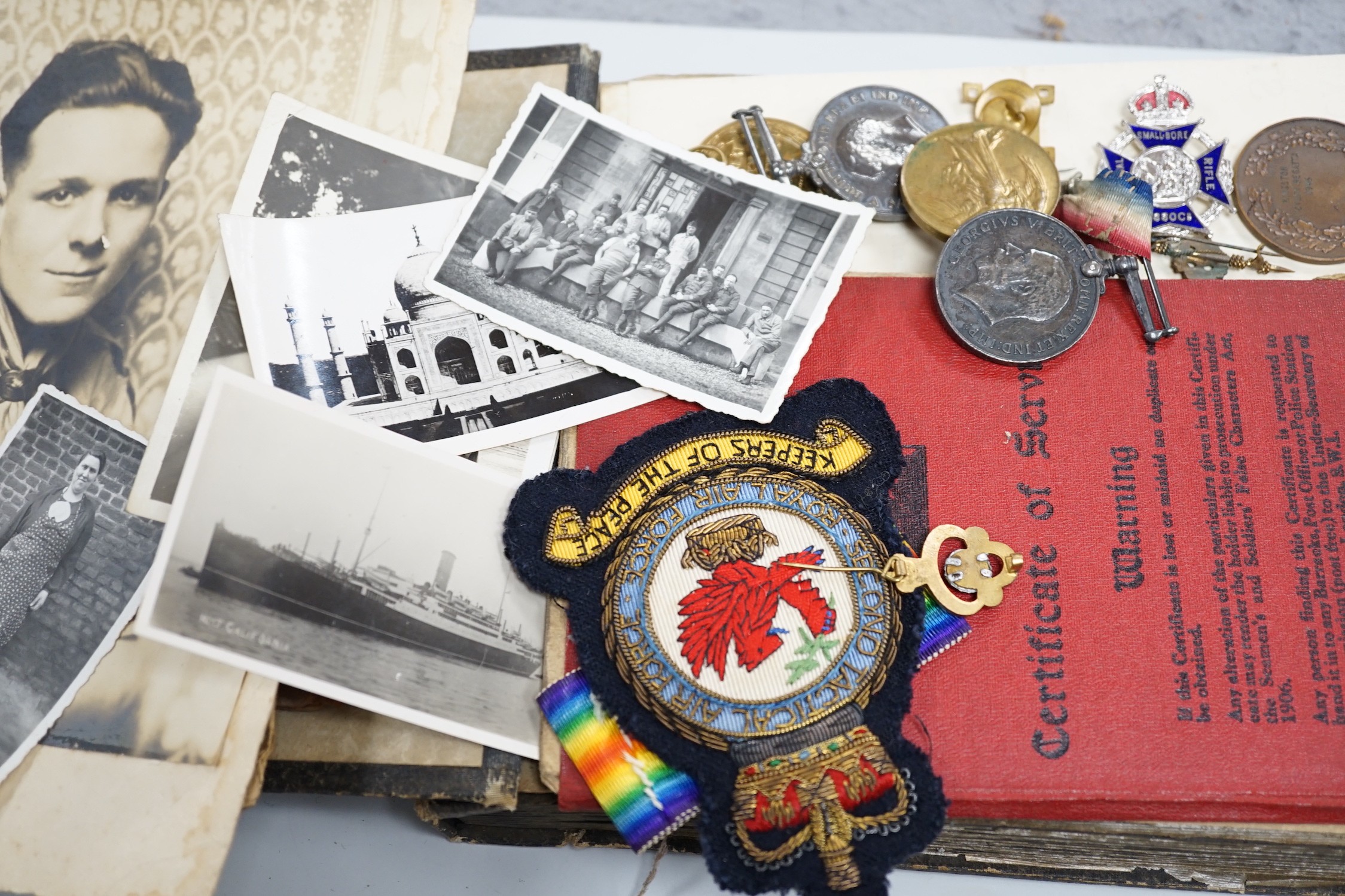 Two pairs of WWI medals awarded to Q.M. & LIEUT. H. BATCHELOR. and 15418 PTE. H. J. BATCHELOR. 19-HRS. together with various military badges, certificates, photographs and paperwork including a regular army certificate o
